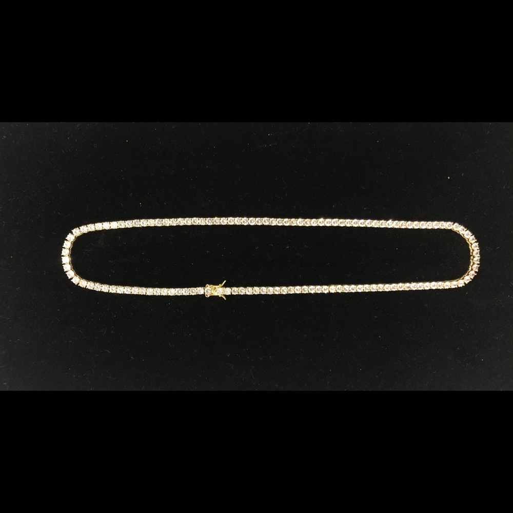 16 in. Gold tennis chain with diamonds